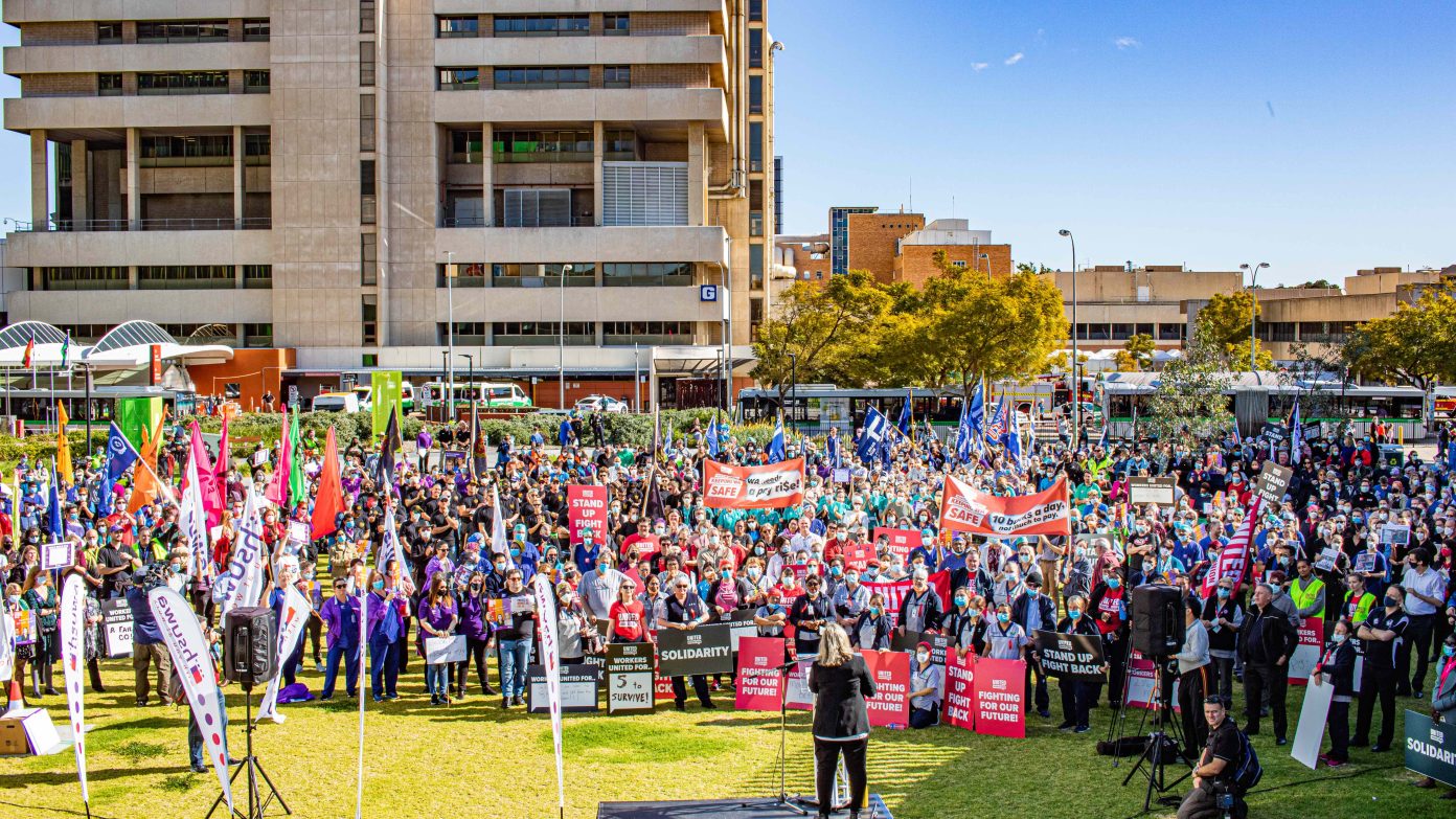 HSUWA Secretary Naomi McCrae addresses a huge crowd of HSUWA, UWU and Public Sector Alliance Members at the QEII Stop Work Meeting.